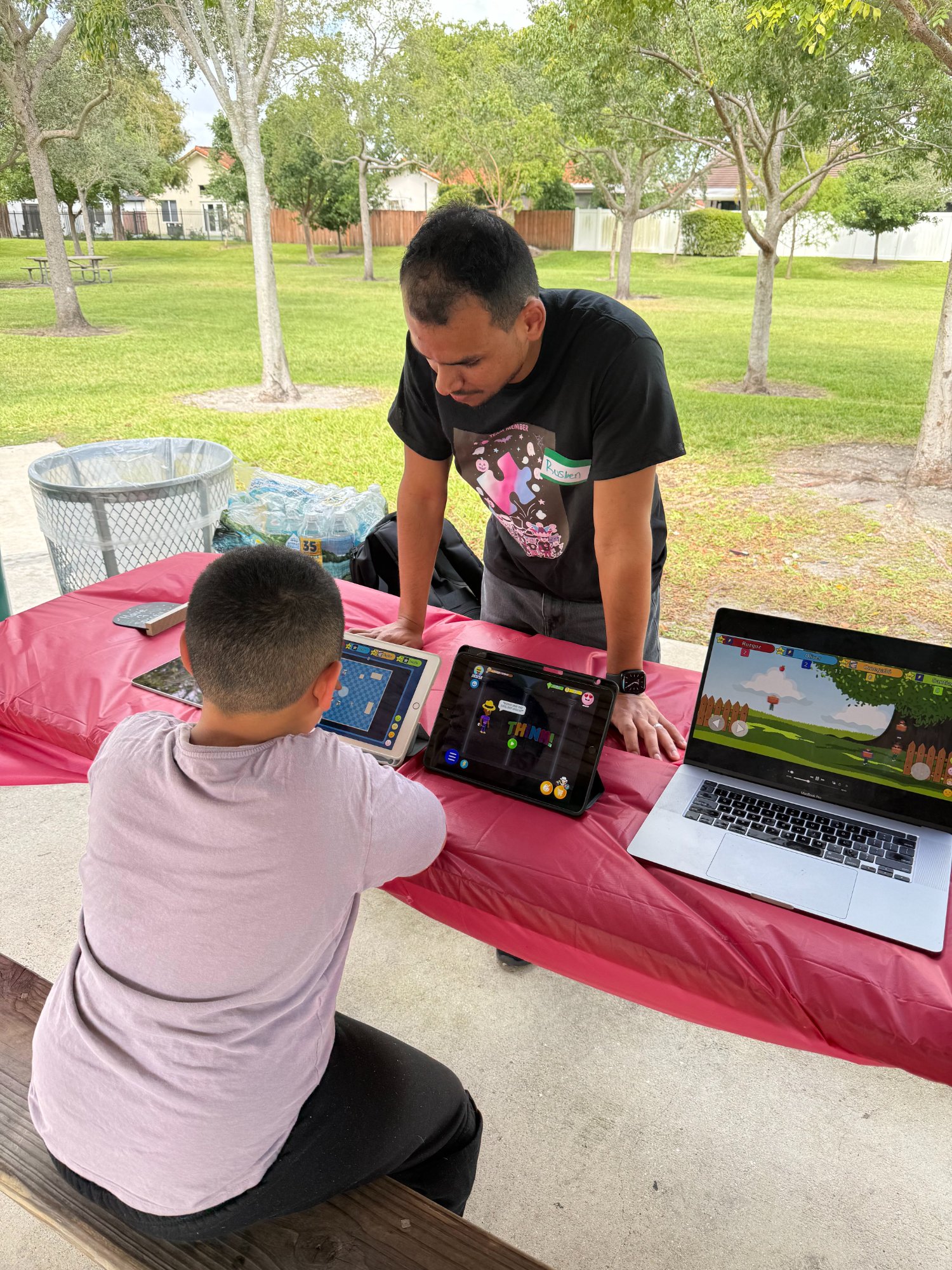 Two boys playing Think! Brain Zone together outdoors