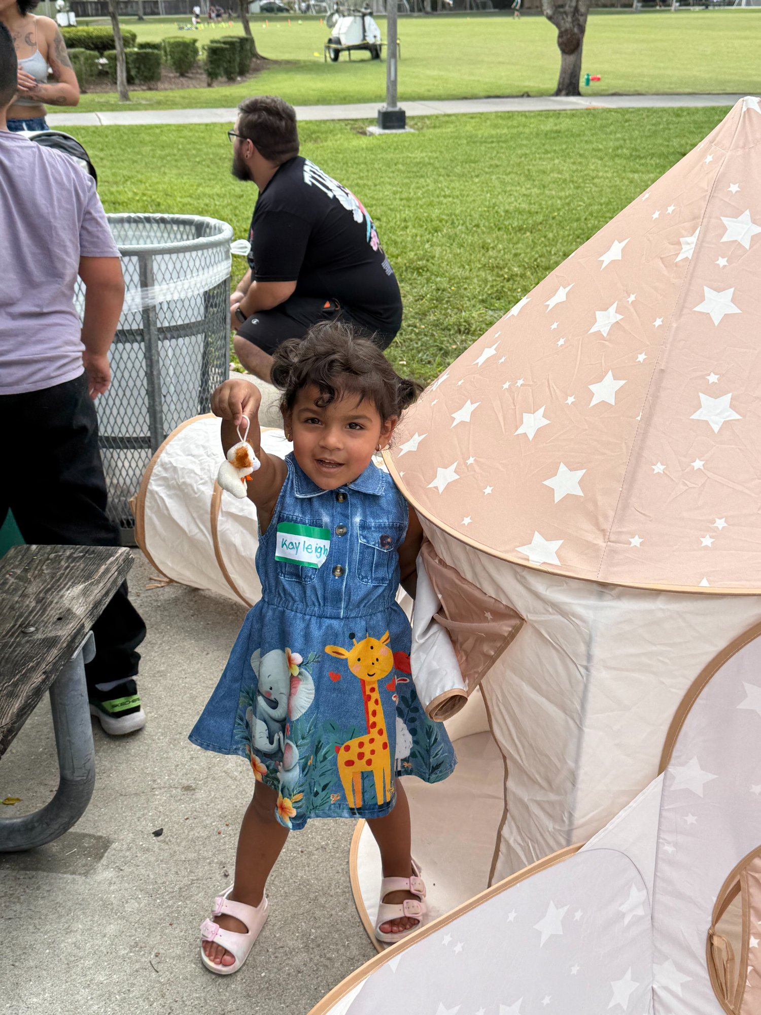 Young girl with animal-themed dress at event