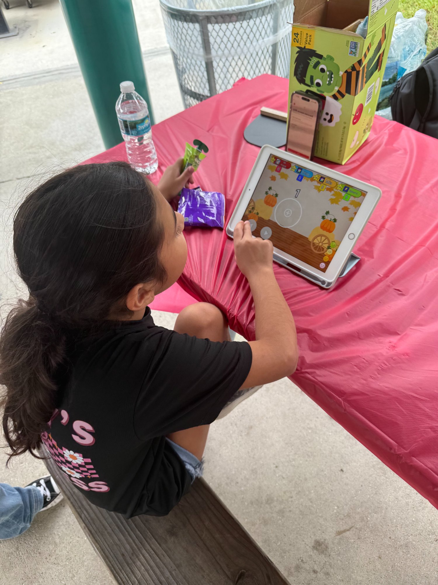 Girl playing Think! Brain Zone mini-game