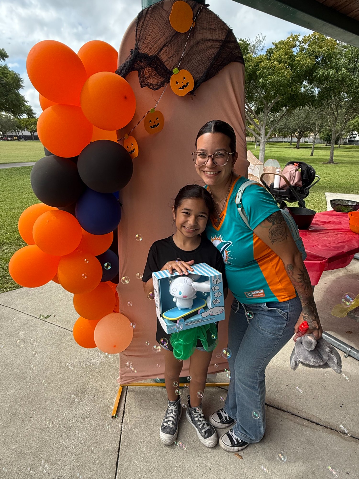 Girl with prize at Halloween event
