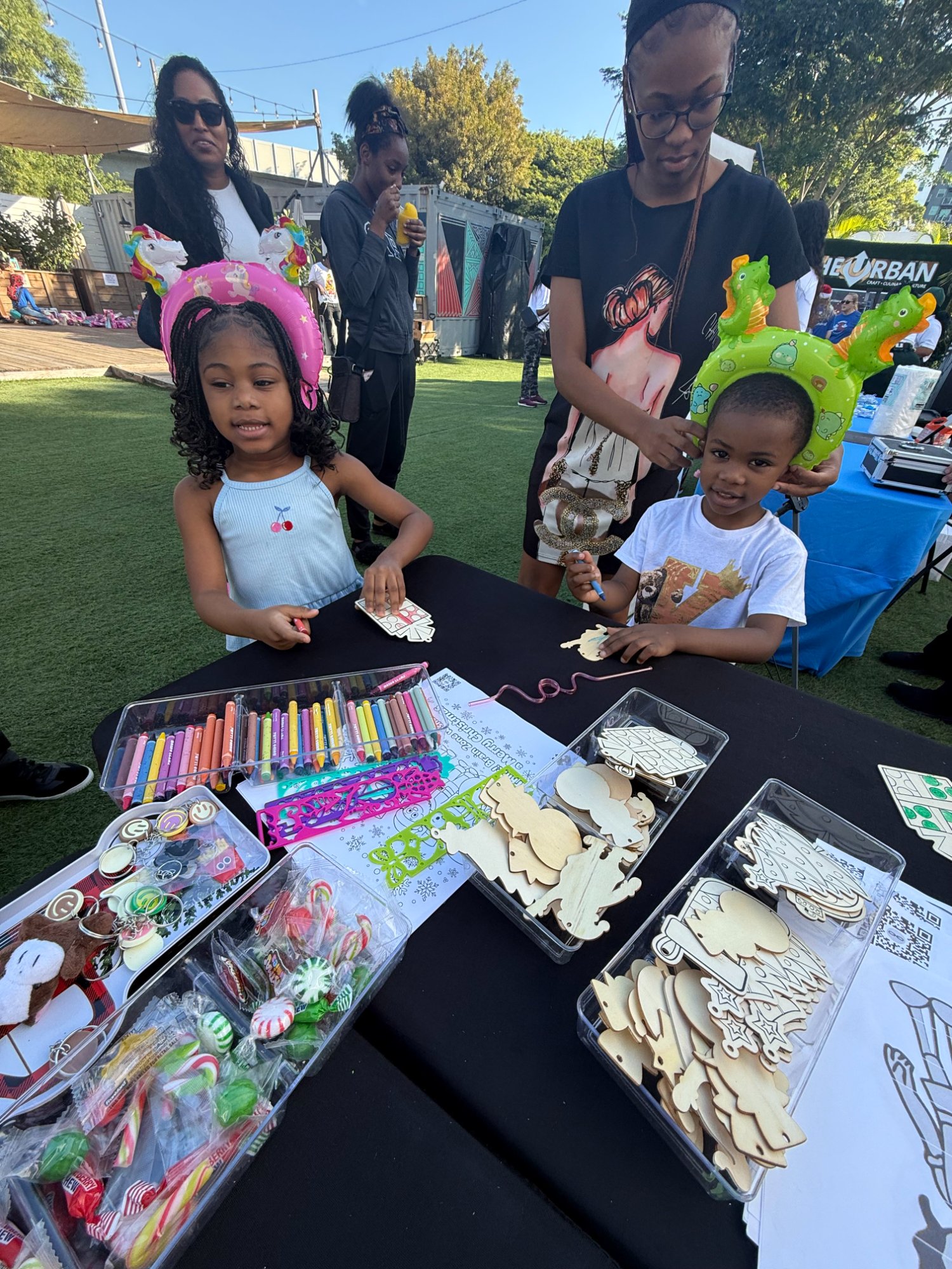 Children doing creative activities at community event