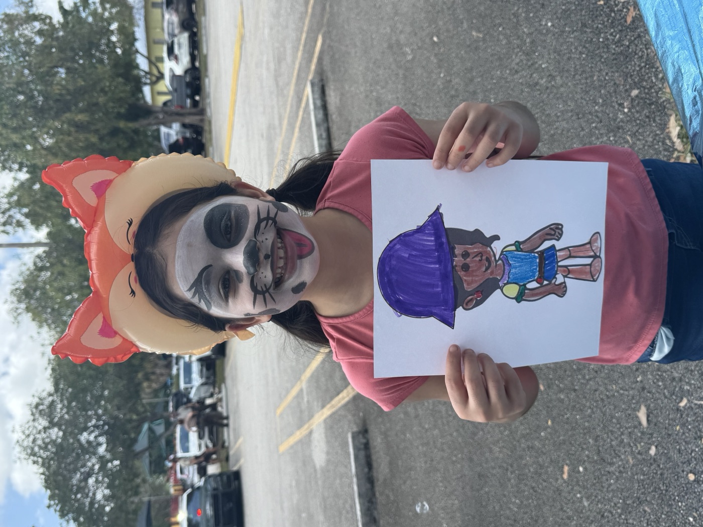 Focused and in the zone — this young creator is fully absorbed in painting at ou