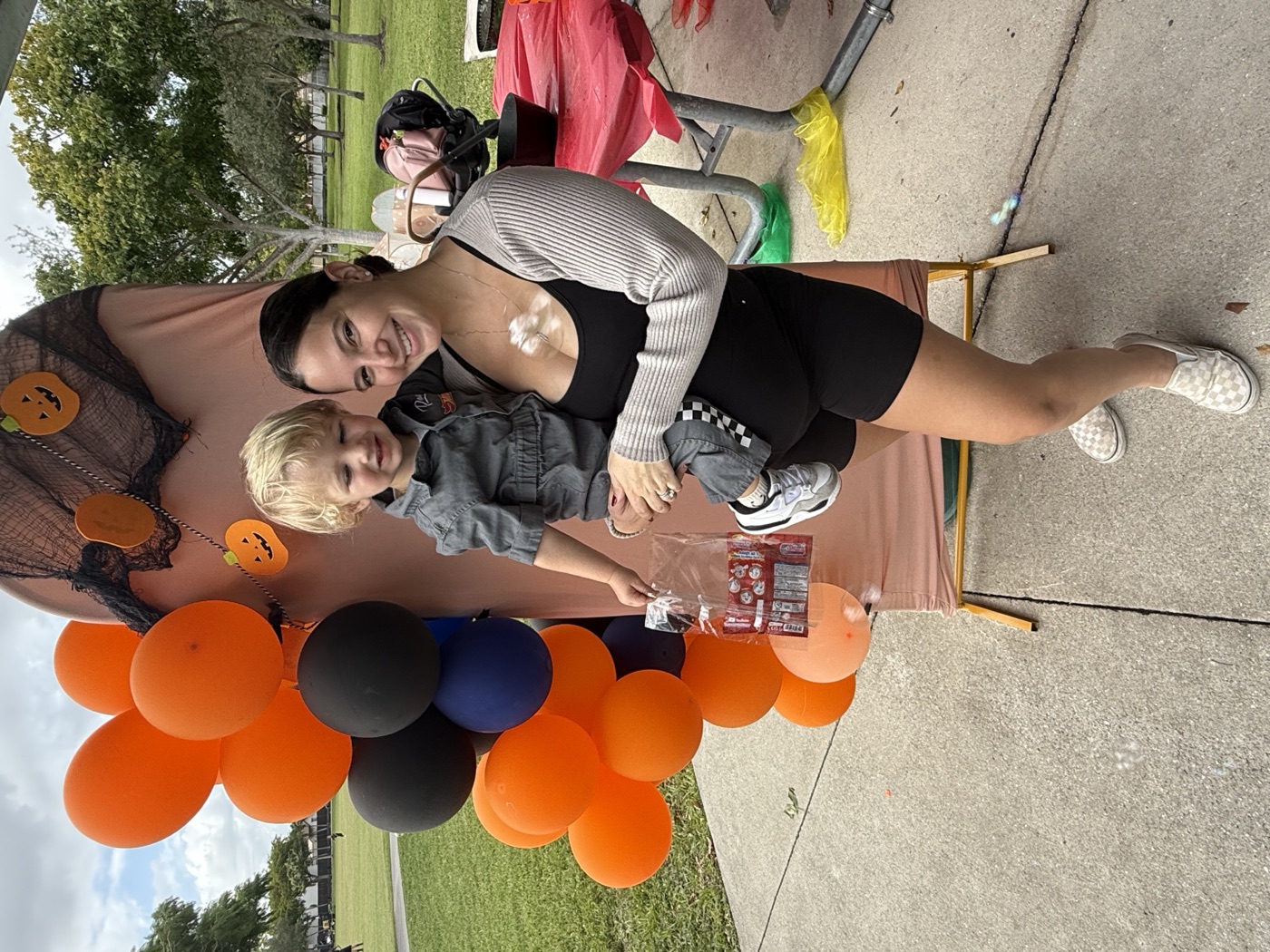 A caregiver and child create something beautiful together — learning and bonding