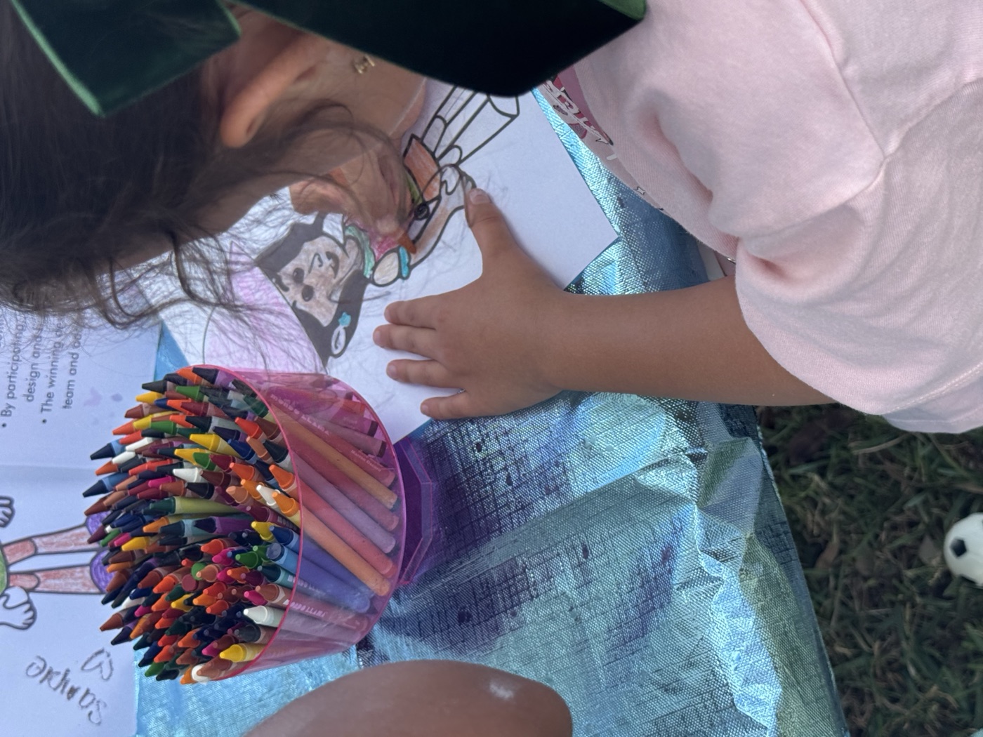 The coloring crew is hard at work — focused kids bringing characters to life wit