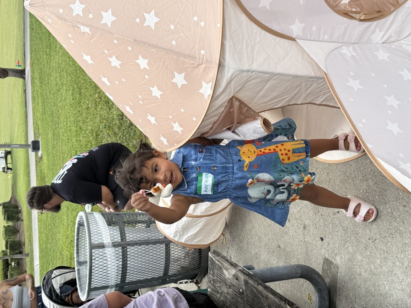 Reading time with friends — children gather around a Think! Brain Zone storybook